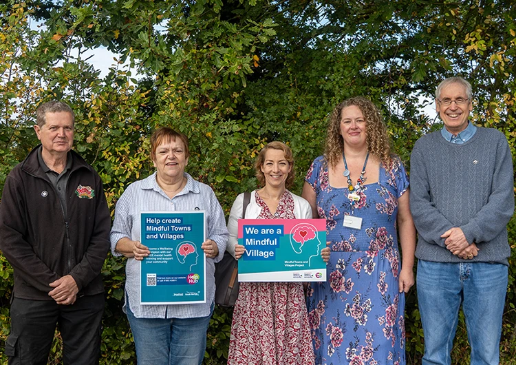 Cllr Natasha Harpley and Cllr Grant Nurden with Chris and Sue Bradbury of Reedham Community Association and Melanie Hoggett of MJB Counselling, marking the two villages' new status.